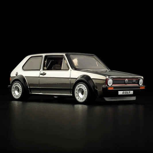 1:64 scale 1976 Volkswagen Golf MK1 GTI in classic red with detailed trim, sporty wheels, and iconic hatchback design.