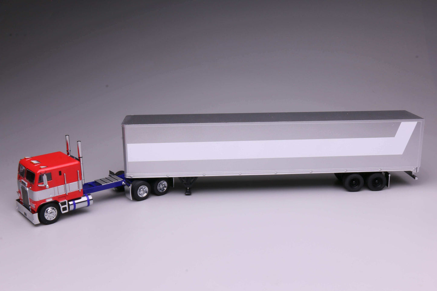 596 1980 Freightliner FL86 Optimus Prime from Transformers Generation 1, HEC 2026 Exclusive 1:64 model with opening cabin and detailed engine.