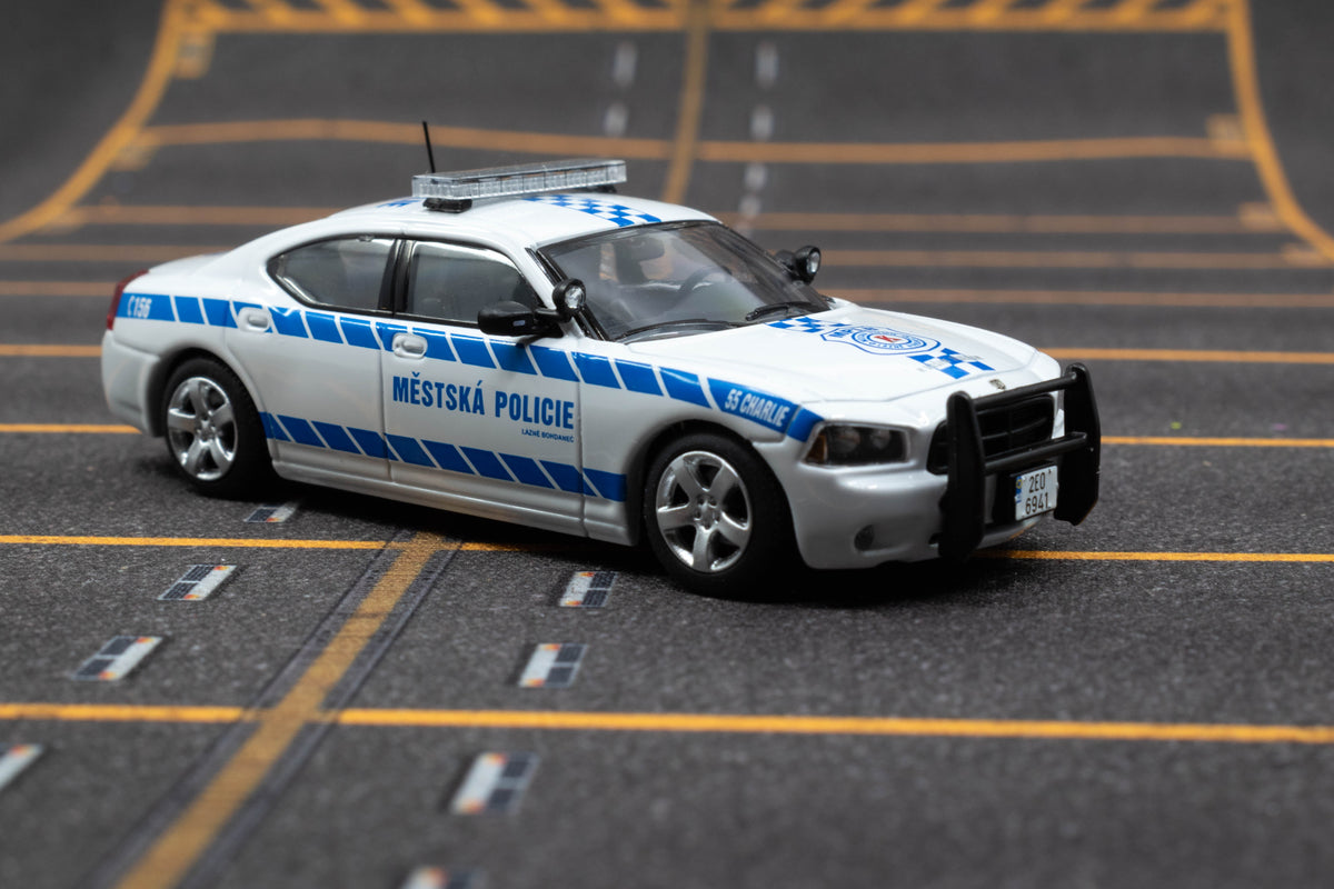 JR Collectibles x Rollin – Městská Policie Lázně Bohdaneč “Charlie” 1:64 scale model police car with authentic Czech markings.