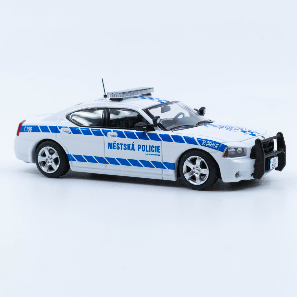 JR Collectibles x Rollin – Městská Policie Lázně Bohdaneč “Charlie” 1:64 scale model police car with authentic Czech markings.