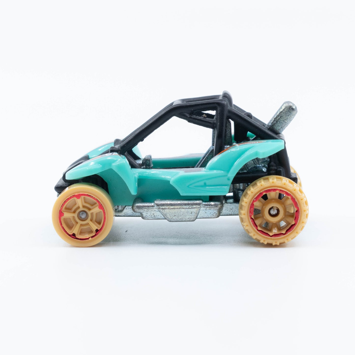Hot Wheels Power Sander die-cast car with large rear wheels, exposed engine, and aggressive design in 1:64 scale. Side