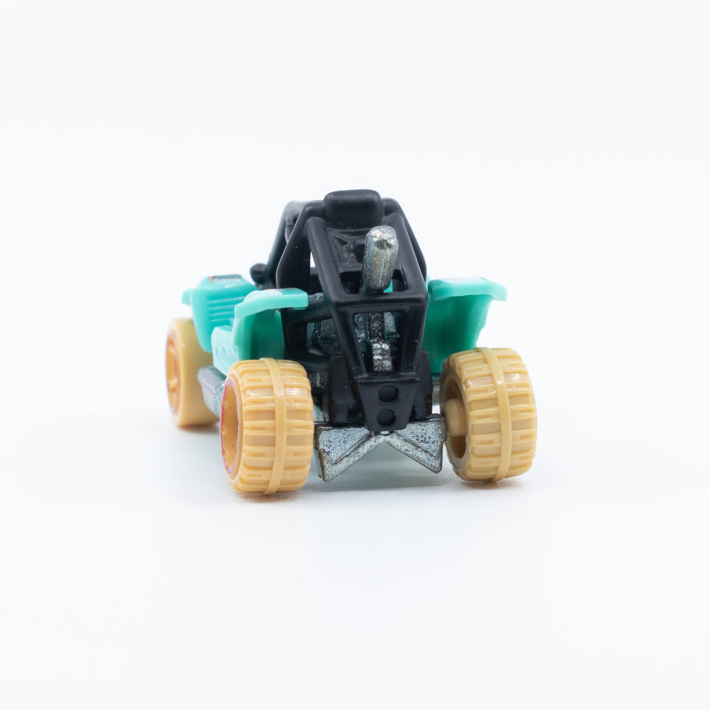 Hot Wheels Power Sander die-cast car with large rear wheels, exposed engine, and aggressive design in 1:64 scale. Back