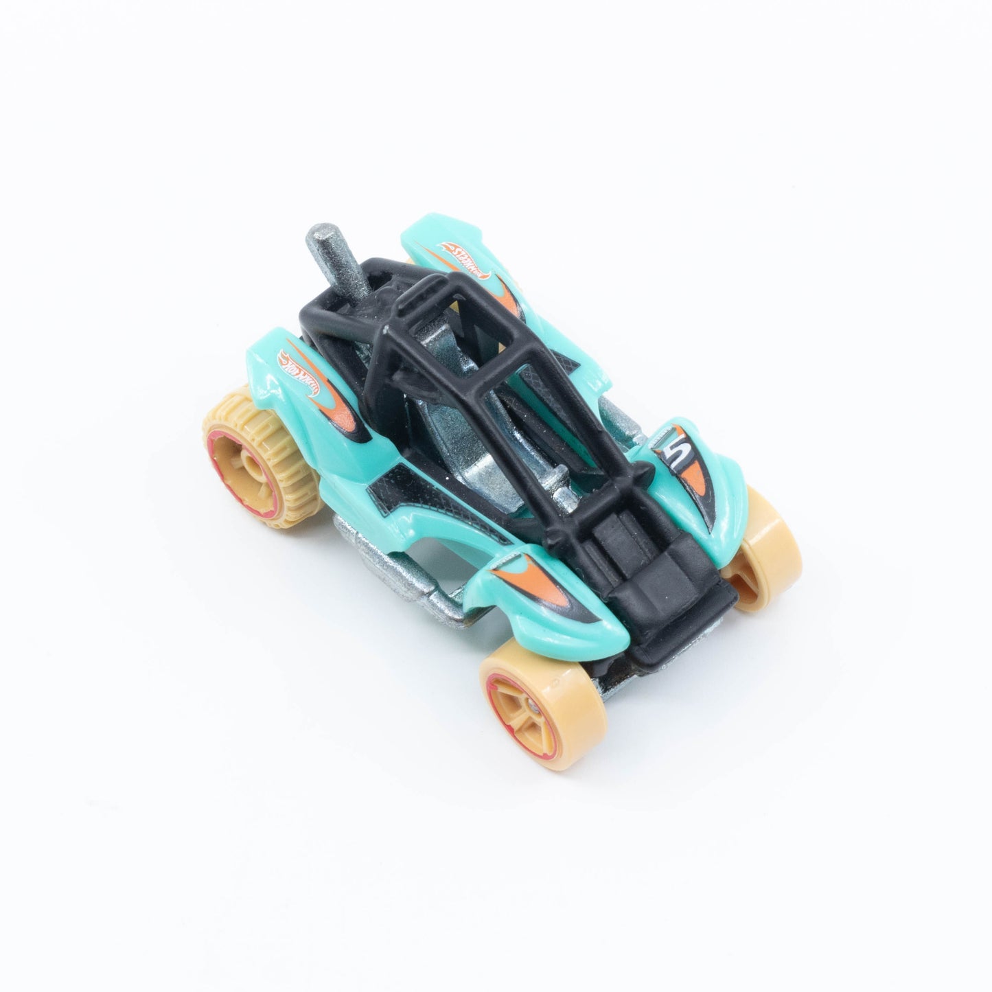 Hot Wheels Power Sander die-cast car with large rear wheels, exposed engine, and aggressive design in 1:64 scale. Top