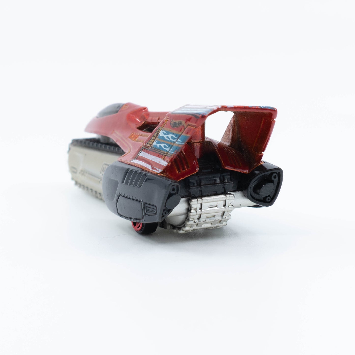 Hot Wheels Tread Air 1:64 scale diecast vehicle with large off-road caterpillar and futuristic design. Back