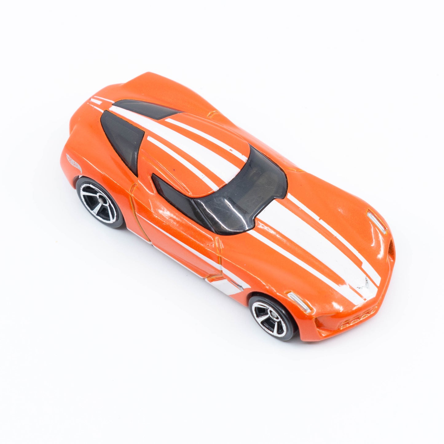 Hot Wheels 2009 Corvette Stingray Concept diecast with futuristic silver design and aerodynamic curves. Top