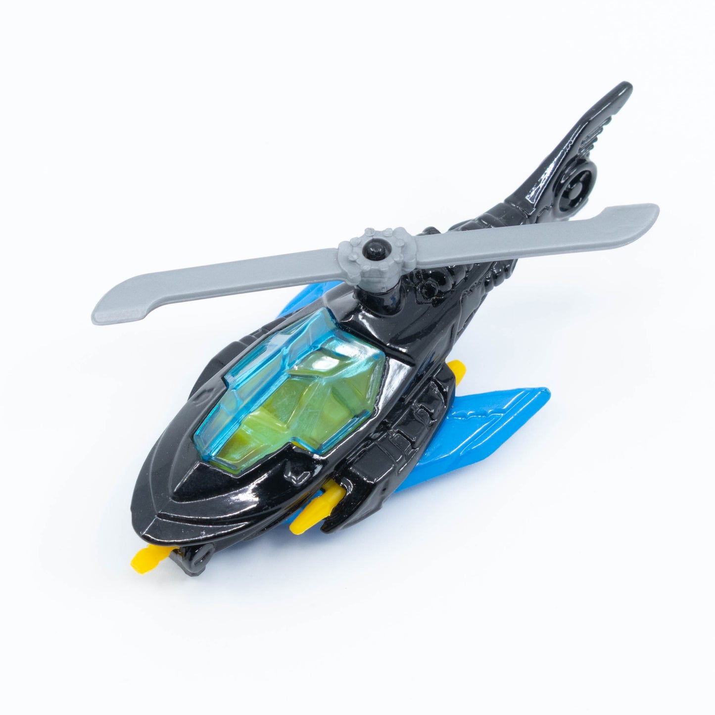 Hot Wheels Batcopter in 1:64 scale with black bat-wing design and spinning rotor blades. Top