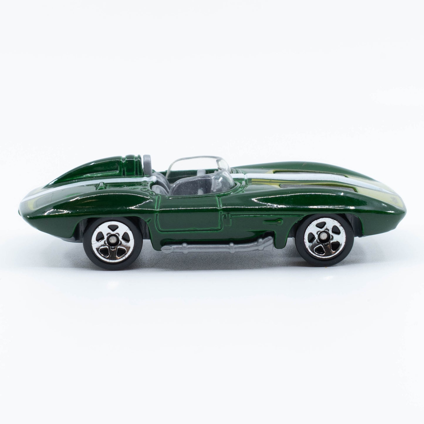 Hot Wheels Corvette Stingray diecast with a sleek, low-profile design and bold detailing. Side