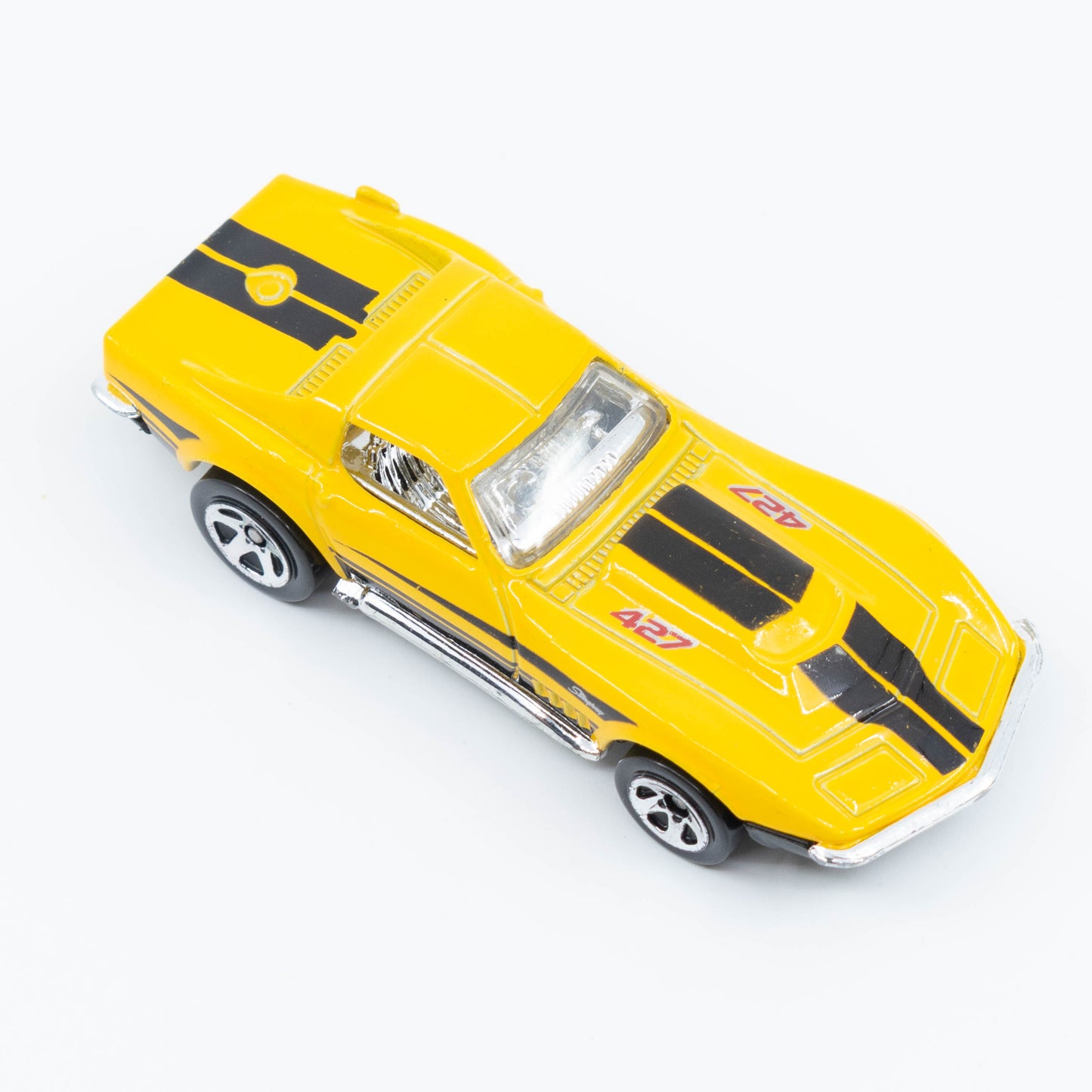 Hot Wheels 1:64 scale '69 Corvette diecast with classic muscle car design and detailed finish. Top