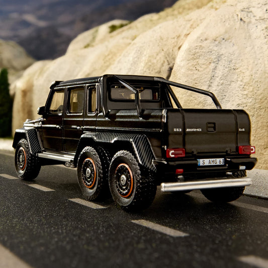 Hot Wheels Elite 64 Mercedes-Benz G 63 AMG 6x6 in matte black with Real Riders wheels and detailed 1:64 construction.