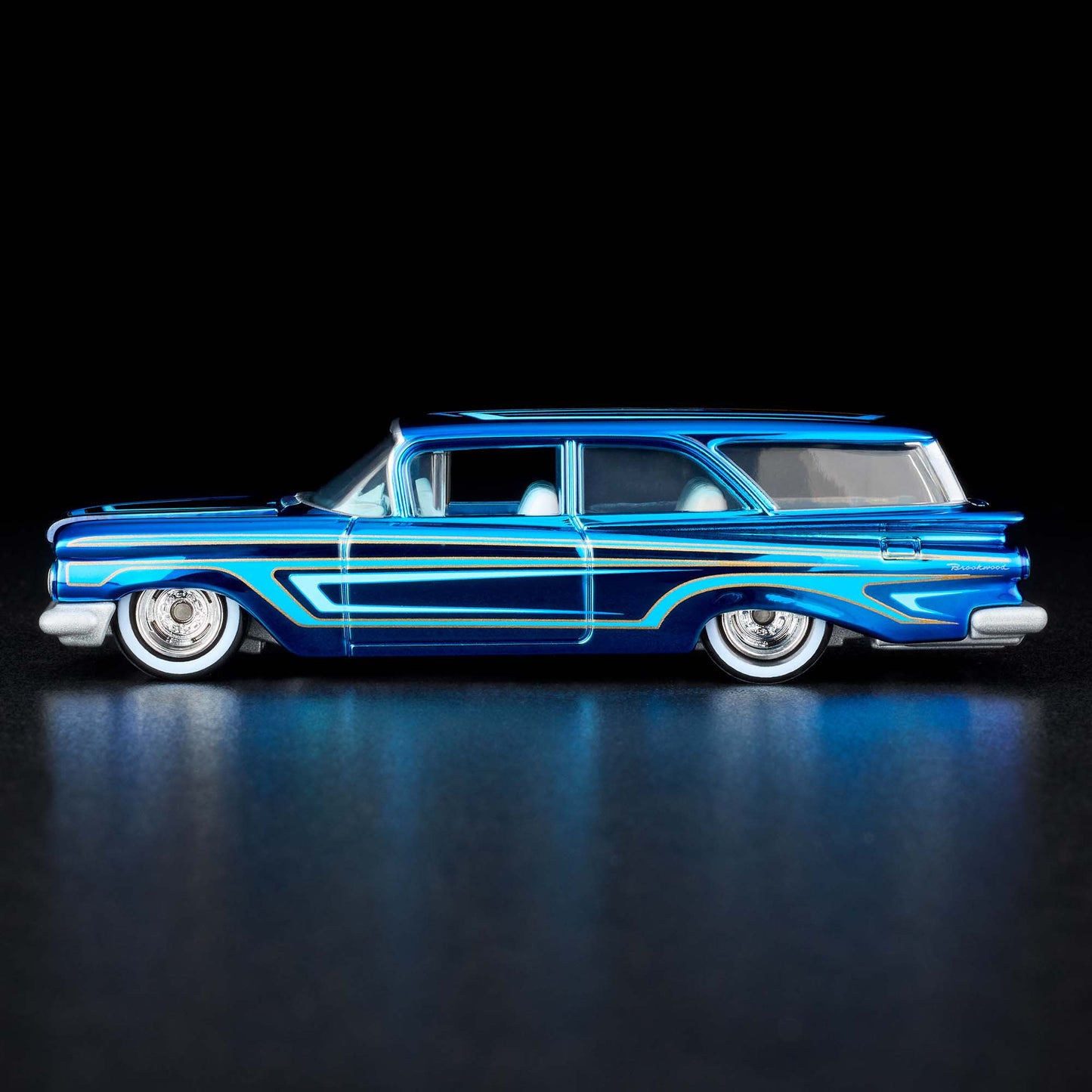 Hot Wheels RLC 1959 Chevrolet Brookwood premium Spectraflame diecast car. Side