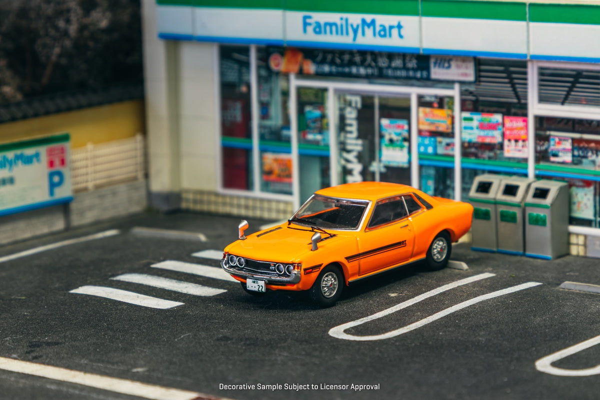 J Collection 1:64 Toyota Celica 1600GT TA22 1970 orange classic JDM coupe diecast model. Front