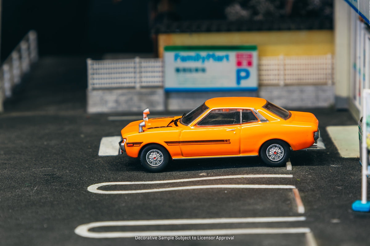 J Collection 1:64 Toyota Celica 1600GT TA22 1970 orange classic JDM coupe diecast model. Side
