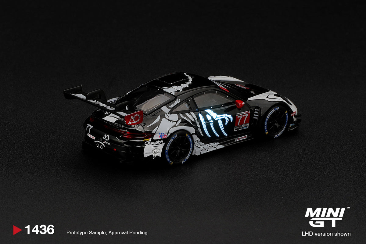 Mini GT Porsche 911 992 GT3 R number 77 AO Racing Skeleton Rexy Petit Le Mans 2026, 1:64 model