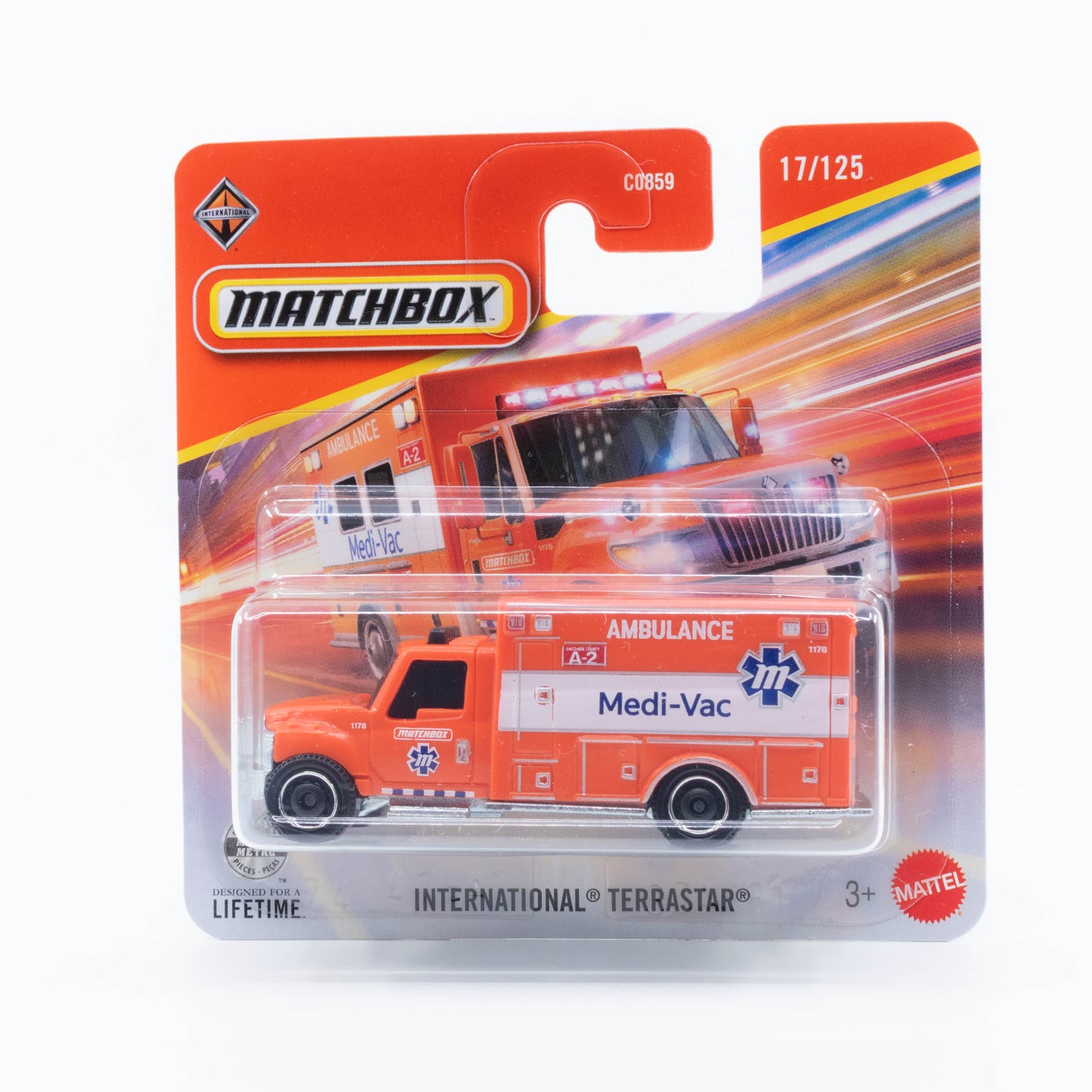 Matchbox 1:64 International TerraStar ambulance in orange and white emergency livery.