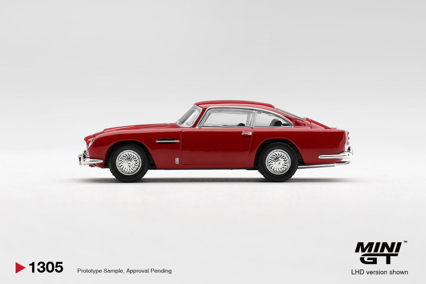 Mini GT Aston Martin DB5 Fiesta Red 1965 1:64 diecast car. Side