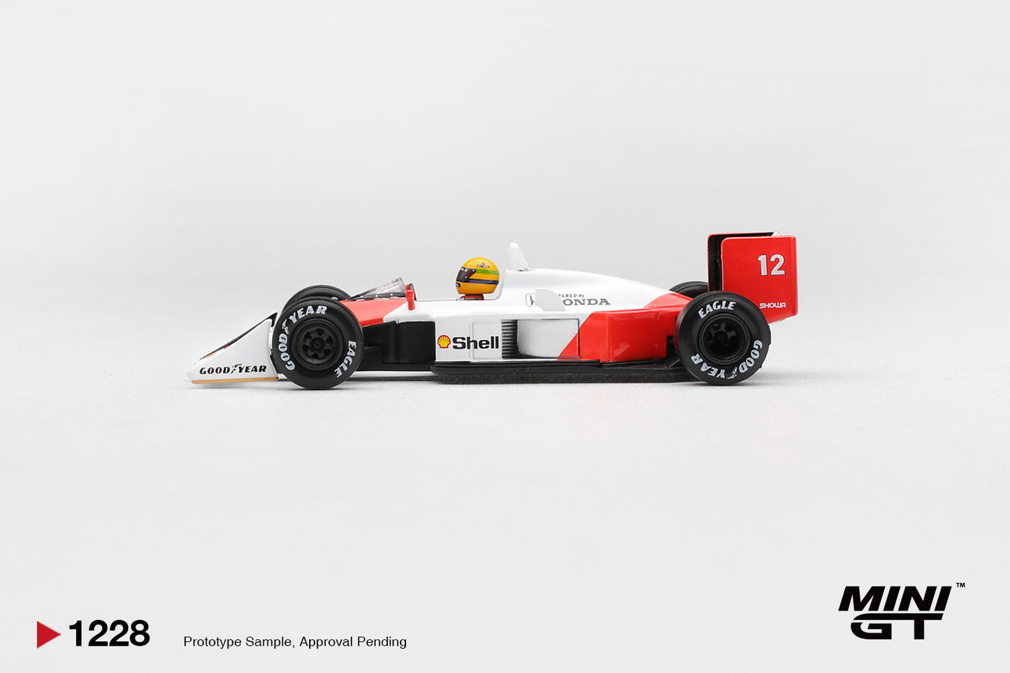 Mini GT McLaren MP4/4 #12 Ayrton Senna 1988 Canadian GP winner 1:64 diecast. Side