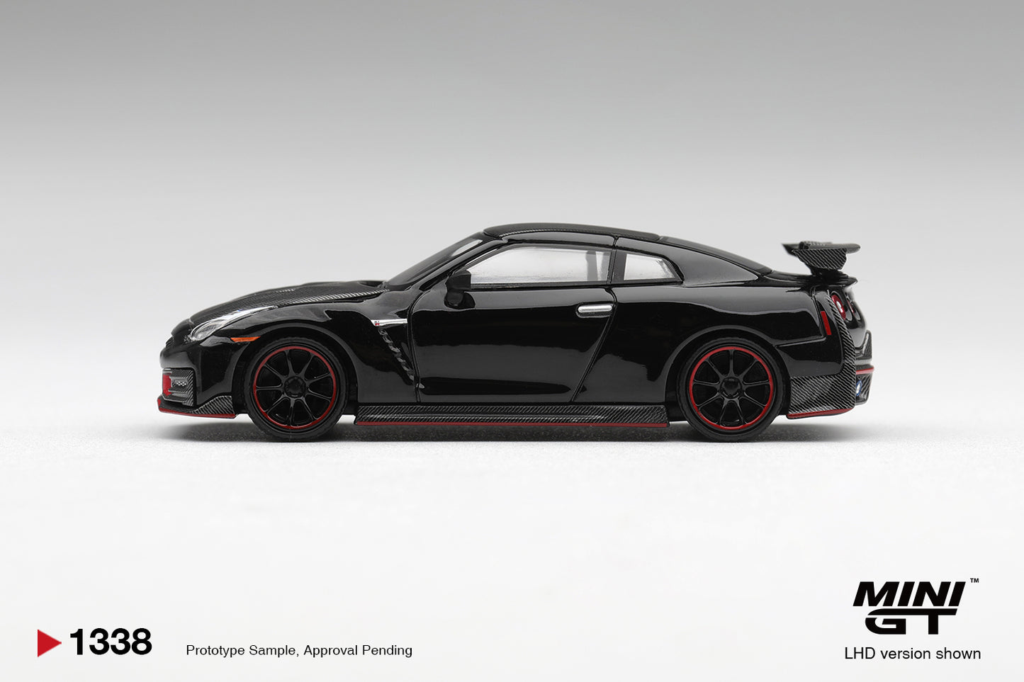 Mini GT Nissan GT-R R35 Nismo 2024 in black.