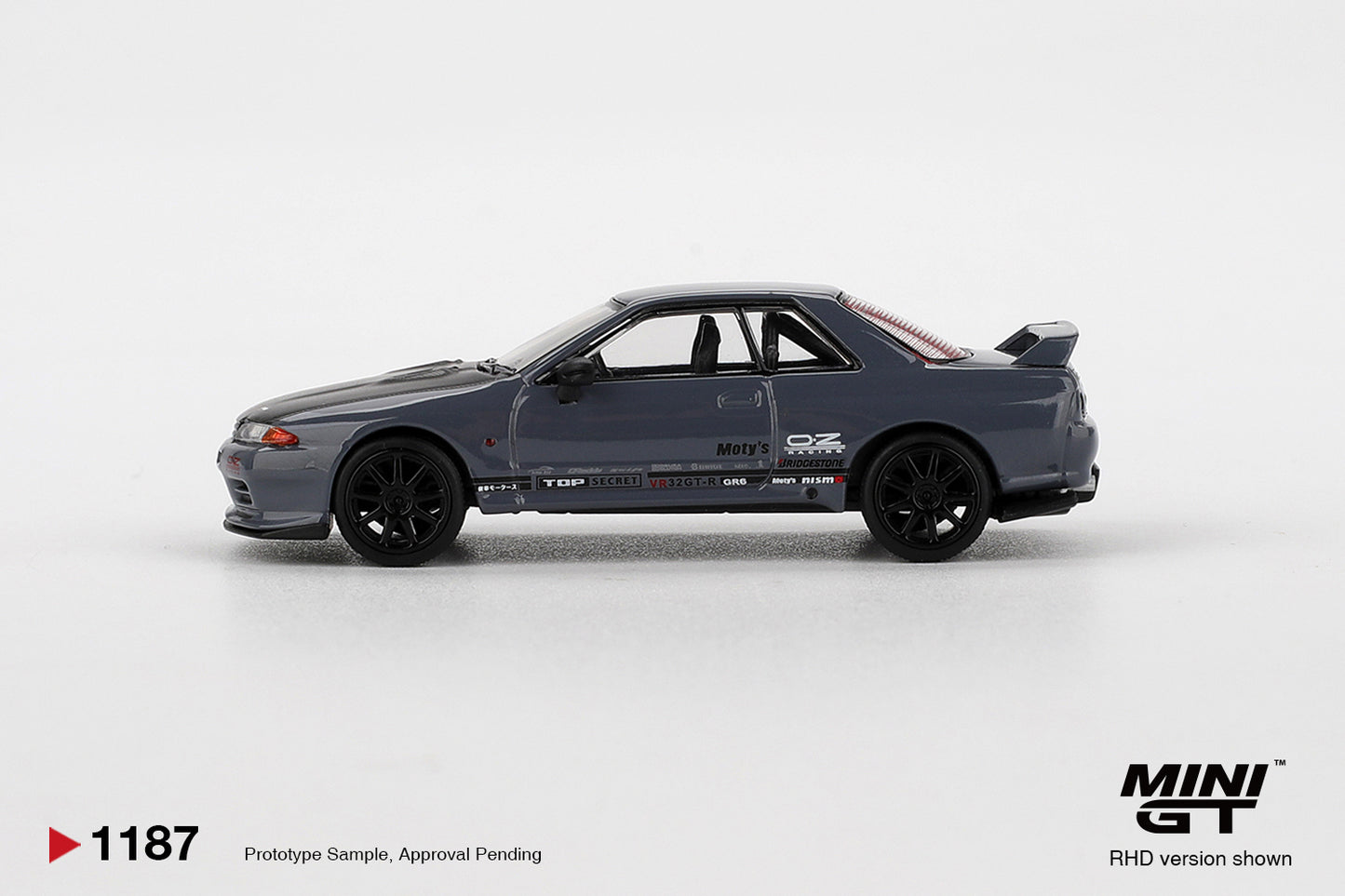 Mini GT 1:64 Nissan GT-R Top Secret VR32 Stealth Grey 2025. Side