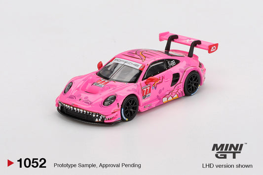 Mini GT 1:64 Porsche 911 GT3 R #77 AO Racing Road America 2024 with colorful livery and racing details. Front