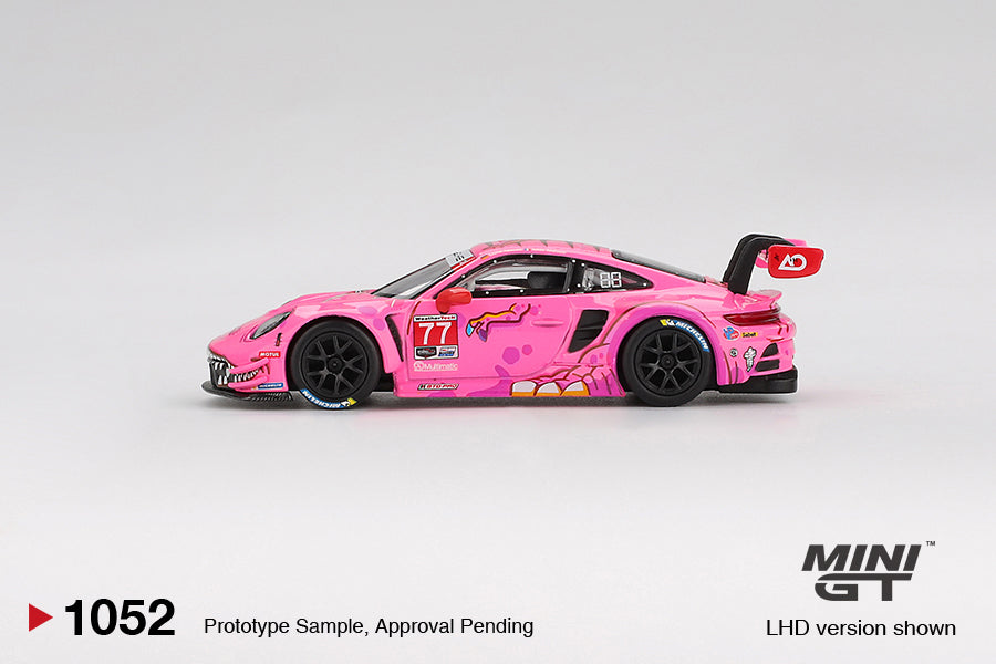 Mini GT 1:64 Porsche 911 GT3 R #77 AO Racing Road America 2024 with colorful livery and racing details. Side