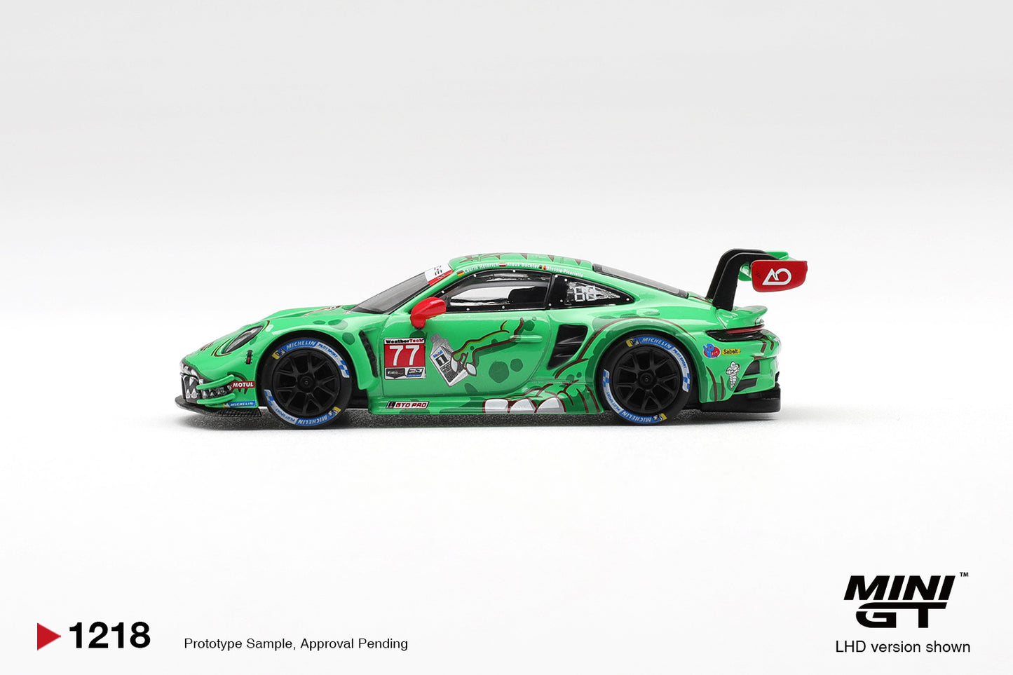 Mini GT 1:64 Porsche 911 GT3 R 992 AO Racing #77 Sebring 2025 diecast model. Side