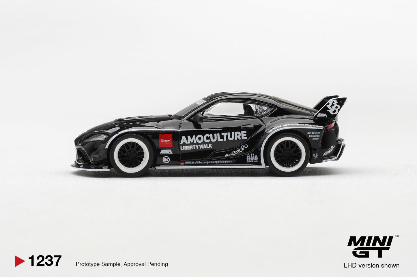 Mini GT Toyota GR Supra LB Works Amoculture 2026 1:64 diecast model. Side