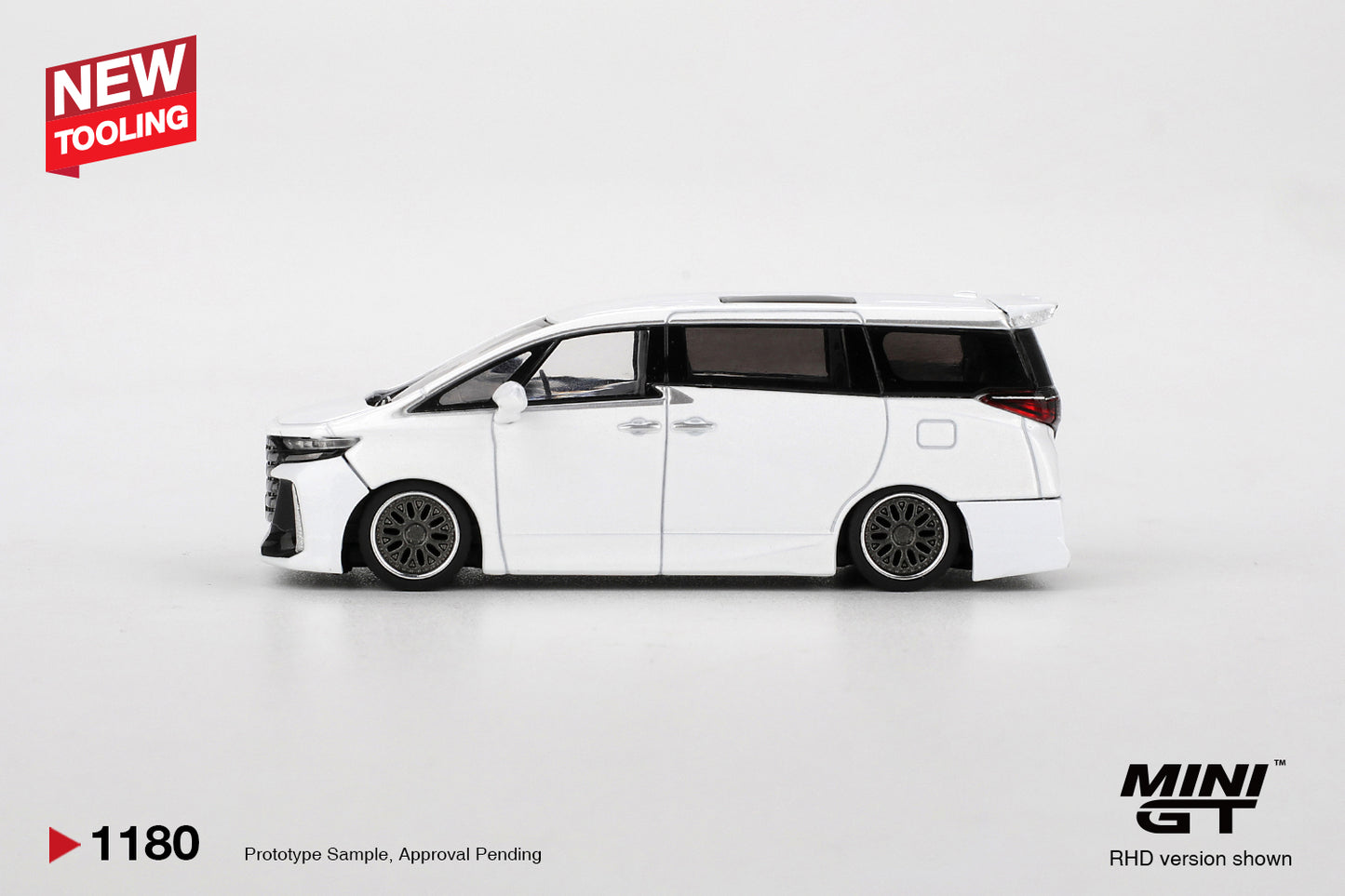 Mini GT 1:64 Toyota Vellfire 40 2025 white diecast model. Side
