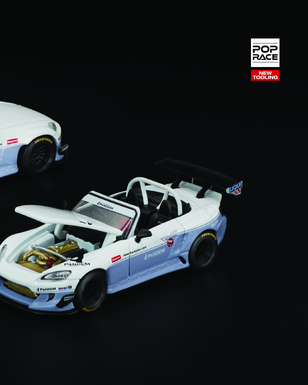 POP Race 1:64 scale white Honda S2000 with Pandem widebody kit, black accents, and detailed wheels. Right