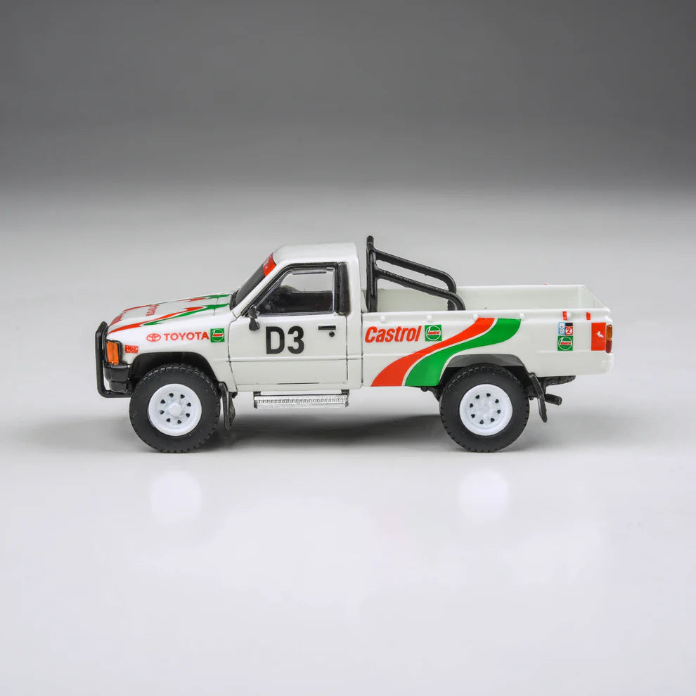 PARA64 1:64 Toyota Hilux 1995 Rustenburg 400 Rally Castrol livery rally pickup diecast model. Side