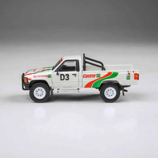 PARA64 1:64 Toyota Hilux 1995 Rustenburg 400 Rally Castrol livery rally pickup diecast model. Side