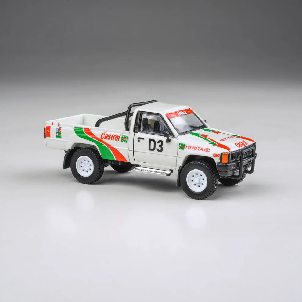 PARA64 1:64 Toyota Hilux 1995 Rustenburg 400 Rally Castrol livery rally pickup diecast model. Front