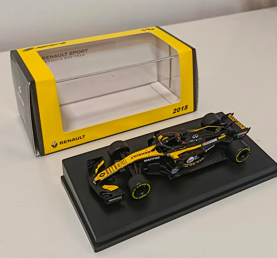 Sparky 1:64 Renault R.S. 18 Formula 1 car in its 2018 launch livery.