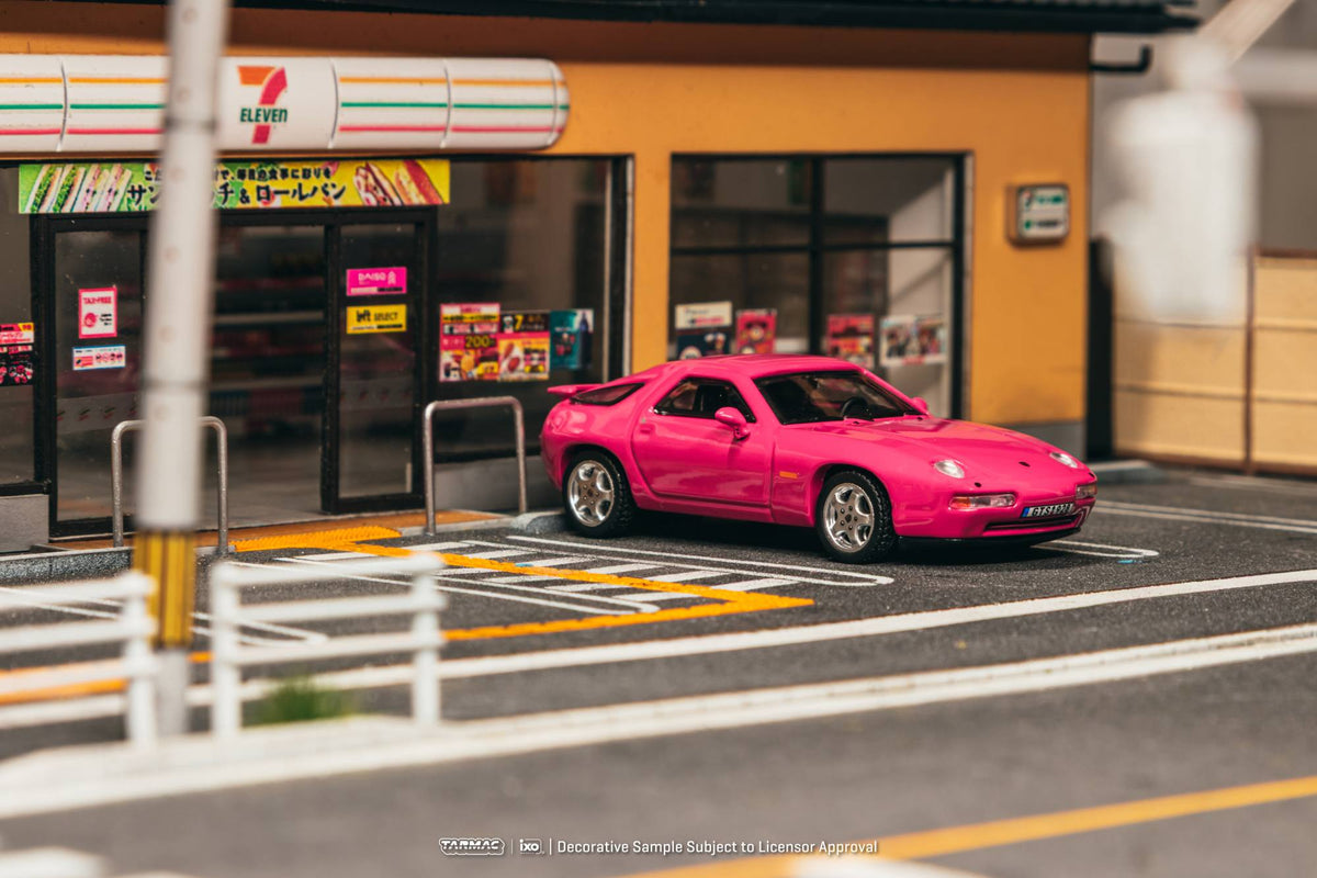 Tarmac Works 1:64 Porsche 928 GTS 1992 Rubystone Red diecast model with pop up headlights. Front