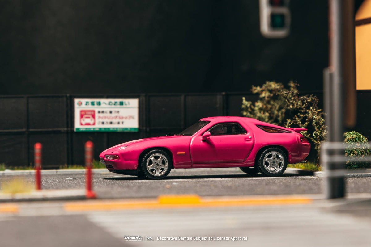 Tarmac Works 1:64 Porsche 928 GTS 1992 Rubystone Red diecast model with pop up headlights. Side