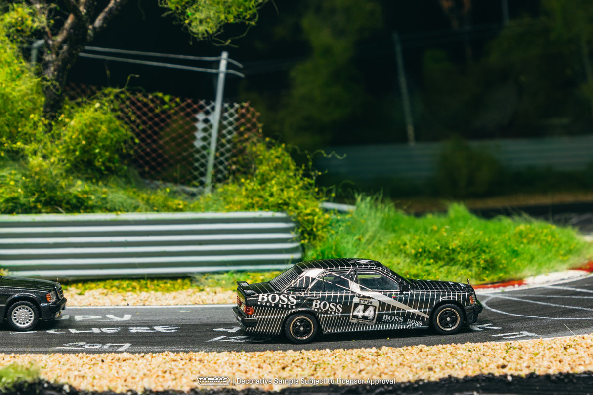 1:64 Tarmac Works Mercedes-Benz 190 E 2.3-16 #44 Johnny Cecotto DTM, featuring authentic DTM racing livery, detailed decals, and period-correct wheels. Side