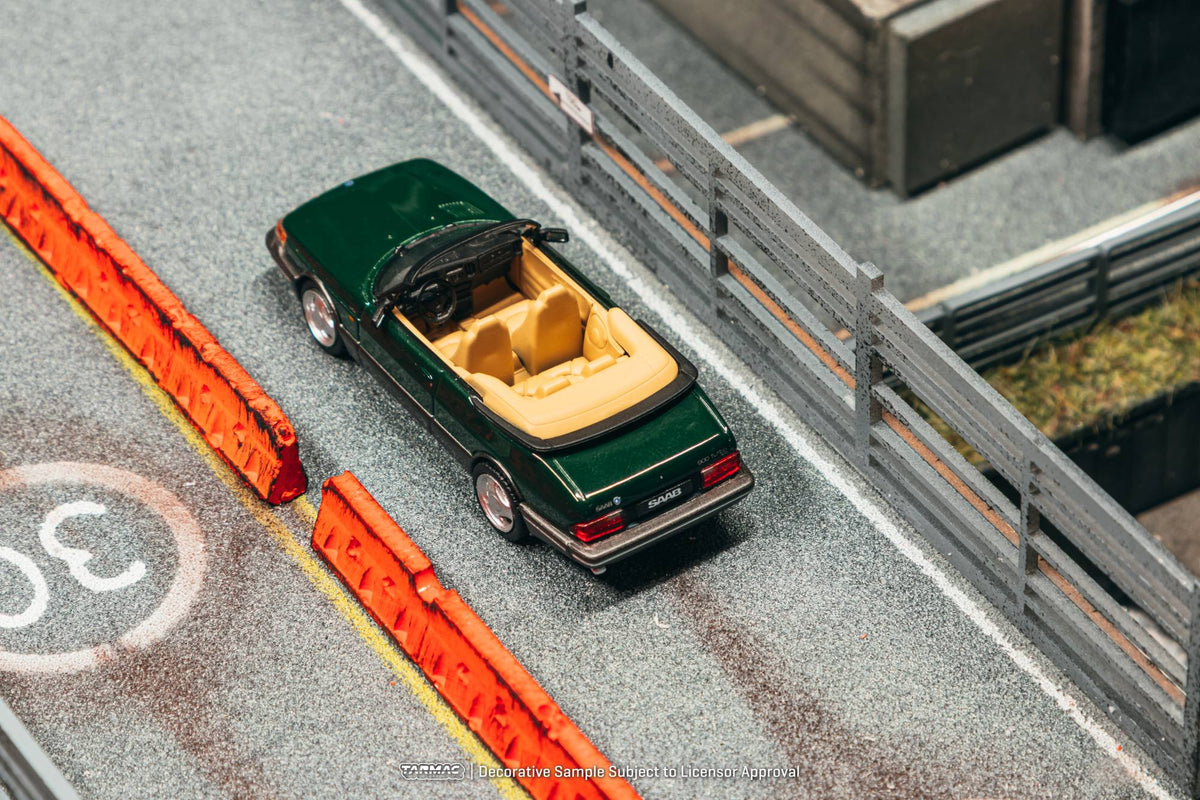 Tarmac Works 1:64 Saab 900 Turbo Cabriolet 1997 dark green diecast model. Top