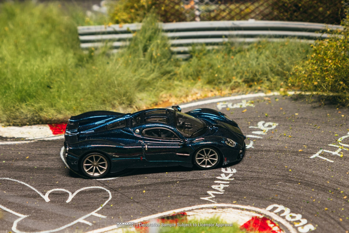 Tarmac Works 1:64 Pagani Utopia 2022 blue metallic modern hypercar diecast model. Side