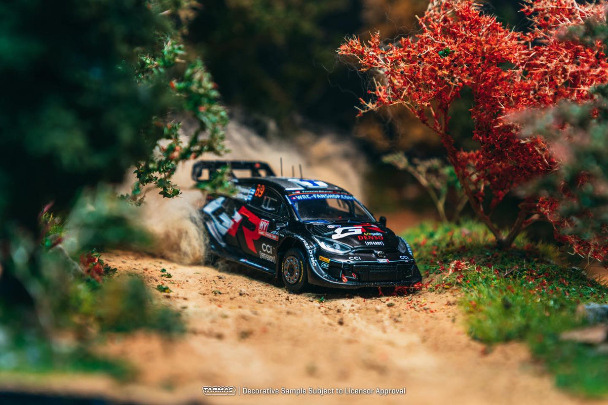 1:64 Tarmac Works Toyota GR Yaris Rally1 Hybrid 2024 Rally Latvia Winner – WRC die-cast model with display base. Front
