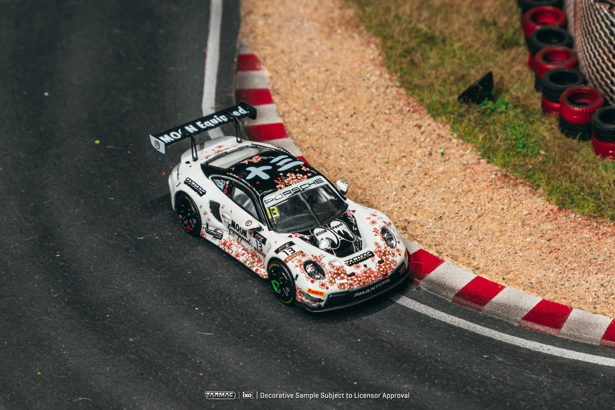 Tarmac Works 1:64 Porsche 911 992 GT3 R #13 Suzuka 1000km Mooneyes sakura livery model with trading cards. Top
