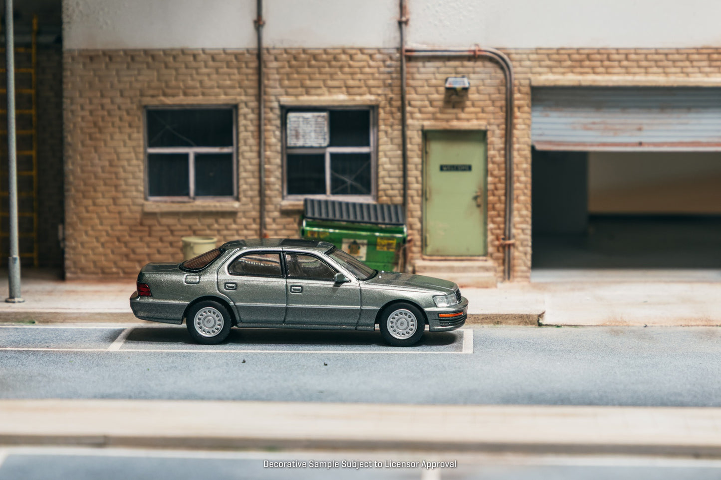 Tarmac Works Lexus LS400 UCF10 in Flint Grey 1:64 diecast car with factory wheels and chrome details. Side