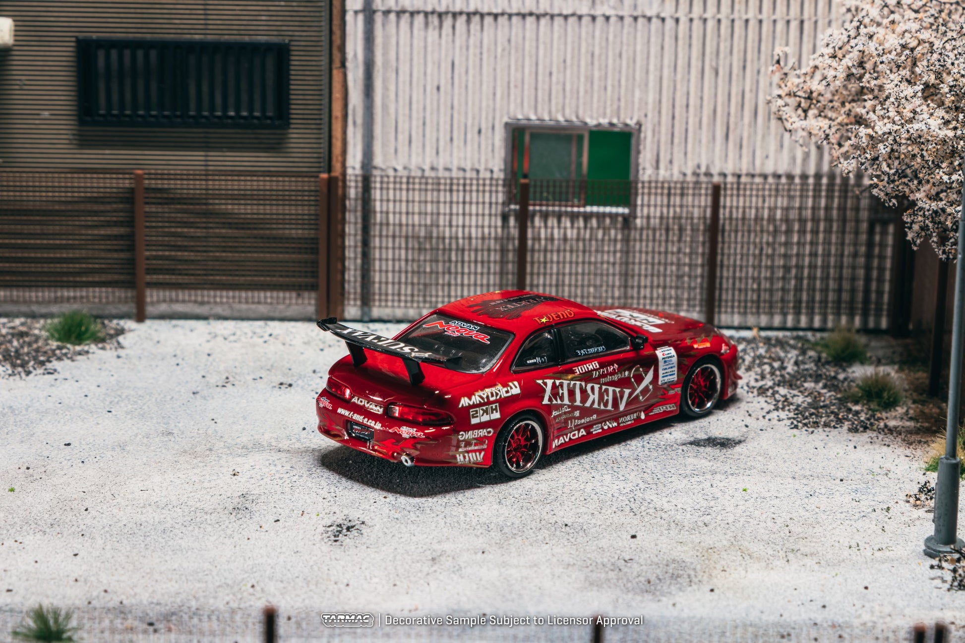 1:64 Tarmac Works Vertex Ridge TE3005 Soarer in red, widebody kit, detailed wheels and lights, part of a Combo Set with collectible trading cards. Back