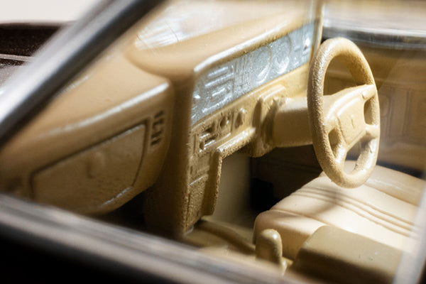 Tomica Limited Vintage NEO 1978 Toyota Crown 2000 Super Saloon Extra in brown, 1:64 scale