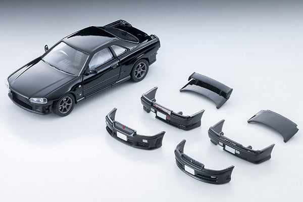 Tomica Limited Vintage 2000 Nissan Skyline 25GT Turbo ER34 in Black with interchangeable exterior parts and rear spoiler options.