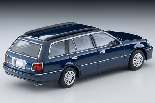 Tomica Limited Vintage 2000 Toyota Crown Estate Royal Saloon in navy blue with detailed front grille and headlights.