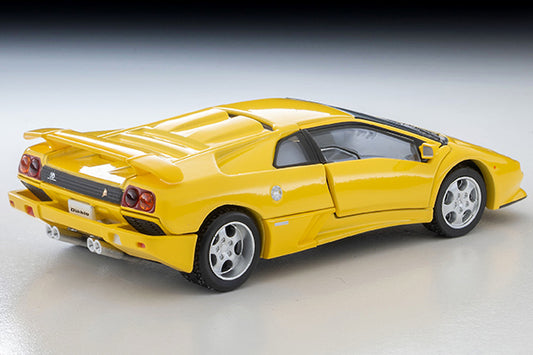 Tomica Limited Vintage Lamborghini Diablo SE30 Jota in yellow with opening scissor doors.