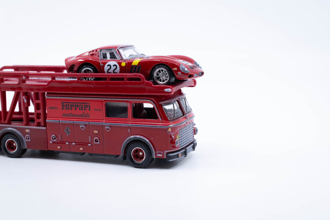 Hot Wheels Team Transport set featuring Fiat 642 RN2 Bartoletti transporter in Ferrari red loading a Ferrari 250 GTO in racing red, both with premium details, accurate proportions and realistic finishes