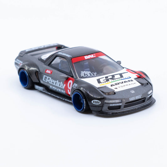 Kaido★House Honda NSX Test Car Spec V1 in grey with blue deep-dish wheels, wide-body kit, pop-up headlights, opening engine hatch and prototype racing livery in 1:64 scale