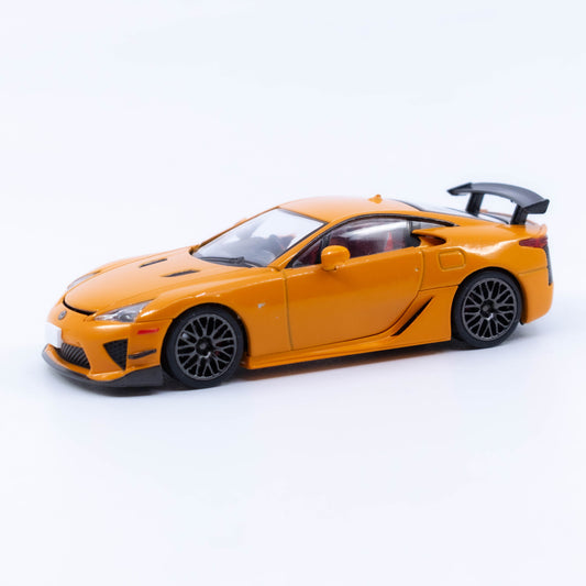 Tomica Limited Vintage Lexus LFA Nürburgring Package in orange, showing its detailed V10, aero package and large rear wing.