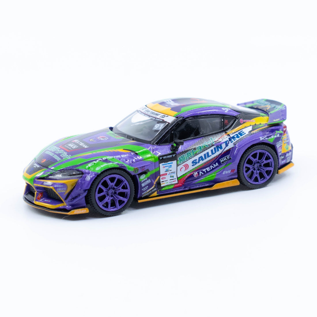 Mini GT Toyota GR Supra KUHL Evangelion Racing 2021 D1GP drift car in detailed anime livery with widebody kit and aggressive stance in 1:64 scale