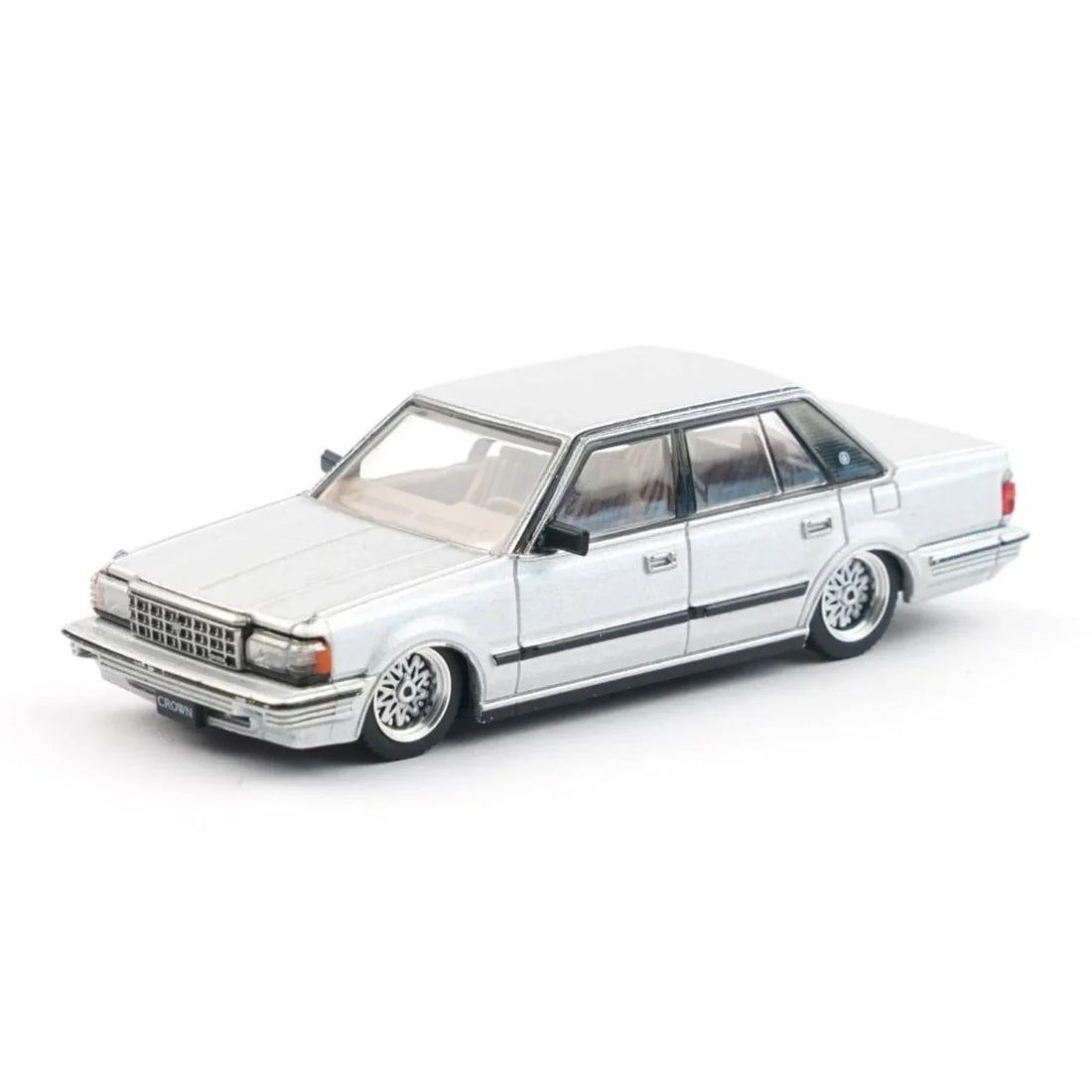 XCARTOYS Toyota Crown Lowrider Silver custom 1:64 model car with slammed stance and chrome detailing.